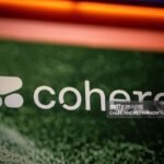 Cohere logo on a green textured background with orange and blue borders, Getty Images credit on the right.