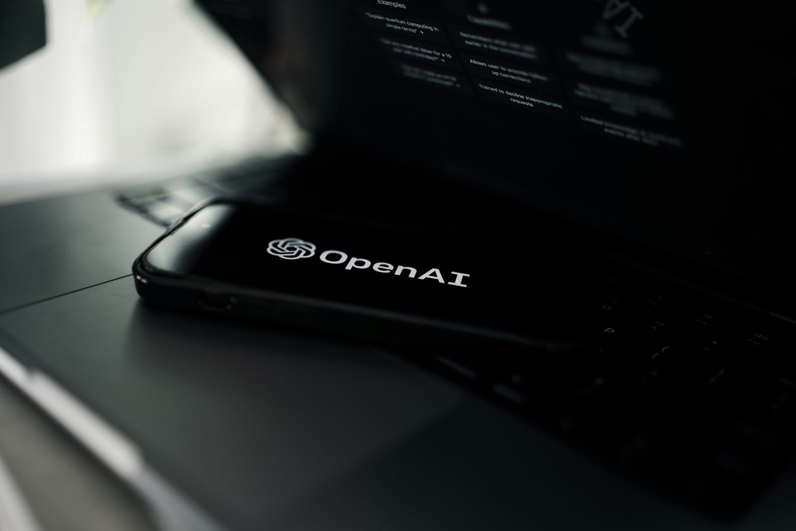 OpenAI funding report on a laptop screen with valuation figures and investor notes