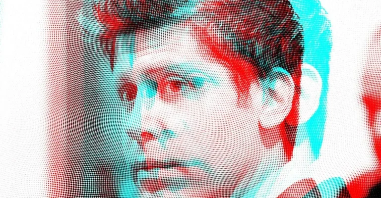 Digitized portrait of a person with a halftone effect in red and blue tones, showing a serious expression.
