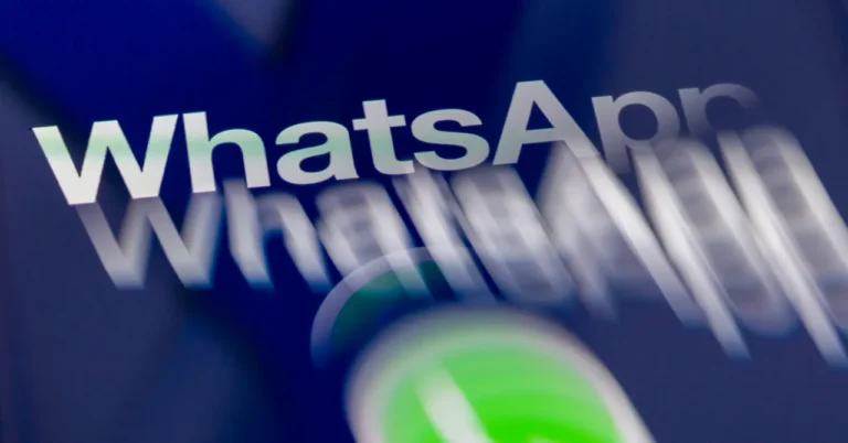 Blurry WhatsApp logo with green icon on a dark background, text appears duplicated and distorted.